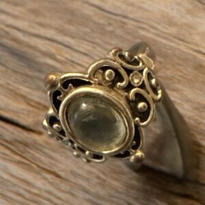 Elegant Gold-Toned Ring with Intricate Design